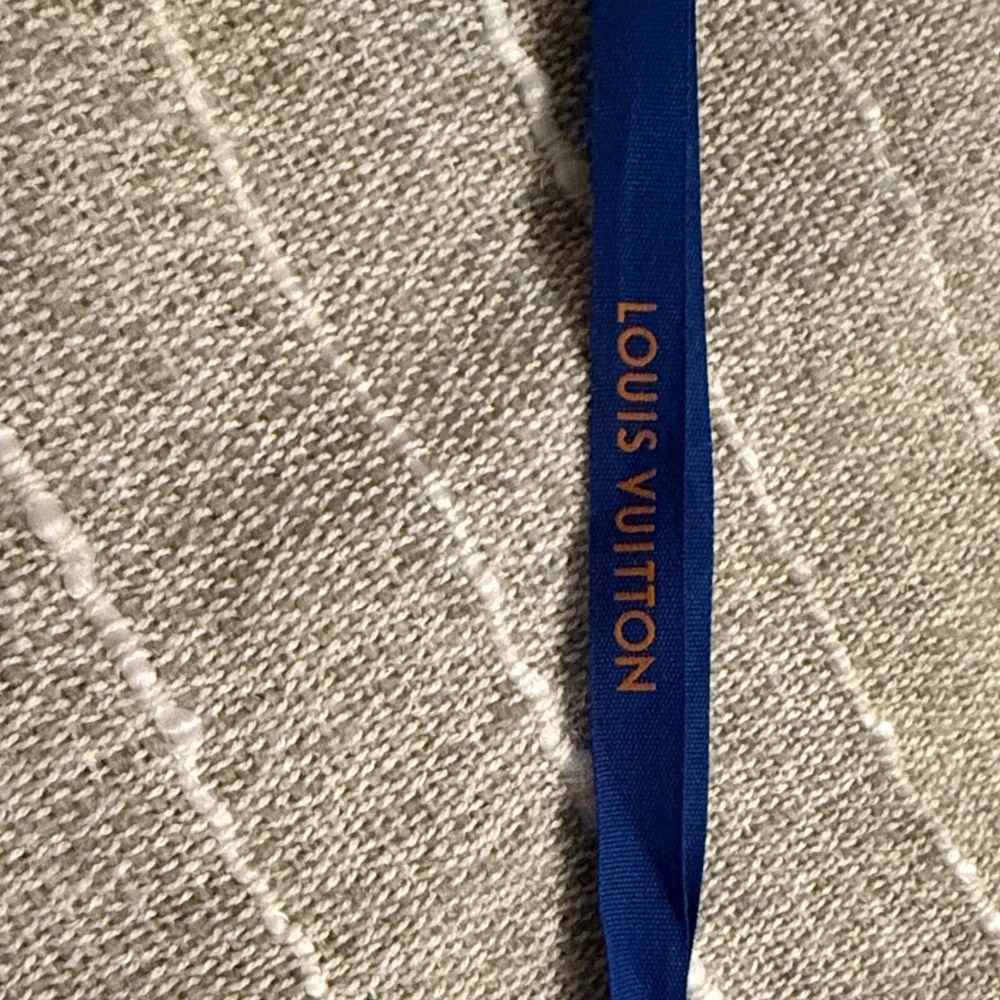 Louis Vuitton Blue Ribbon with Gold Text